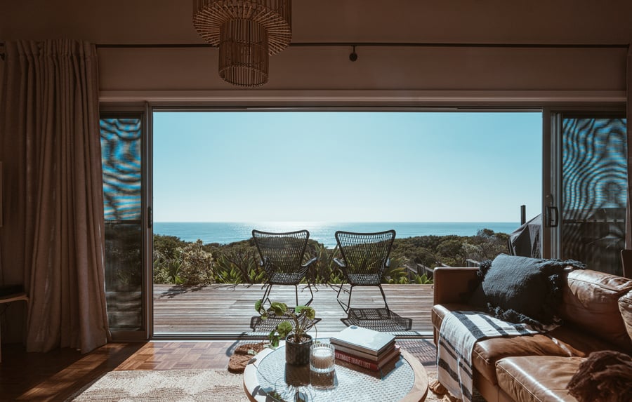 Terrace of modern villa overlooking ocean